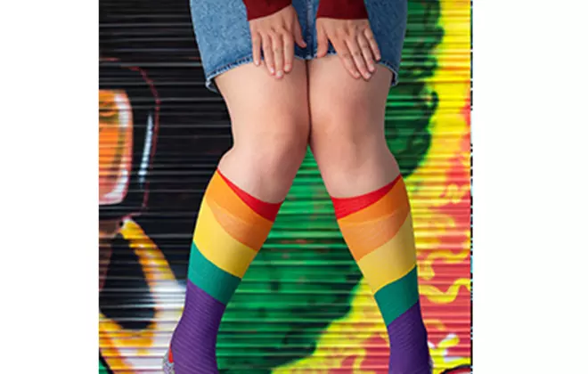 Cheerful rainbow knee-highs featuring LYCRA® MADE TO FIT YOU technology to comfortably fit plus size calves